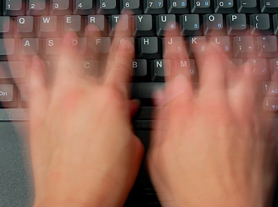 Two Hands Typing on a Keyboard Photo courtesy of ©iStockphoto.com/sdominick, Image #103597