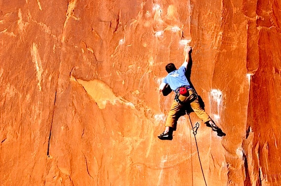 Male rock climber stretching for hold - Photo courtesy of ©iStockphoto.com/seanrmcdermid, Image #5852903