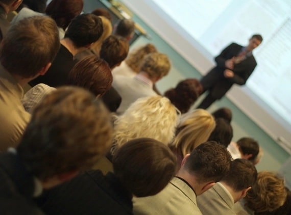 A Speaker in Front of an Audience - Photo courtesy of ©iStockphoto.com/vm, Image #2558258