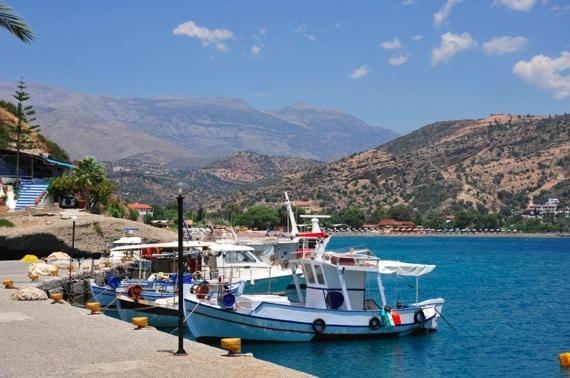 A Pier with Boats in Greece - Photo courtesy of ©iStockphoto.com/clubfoto, Image #13426165 