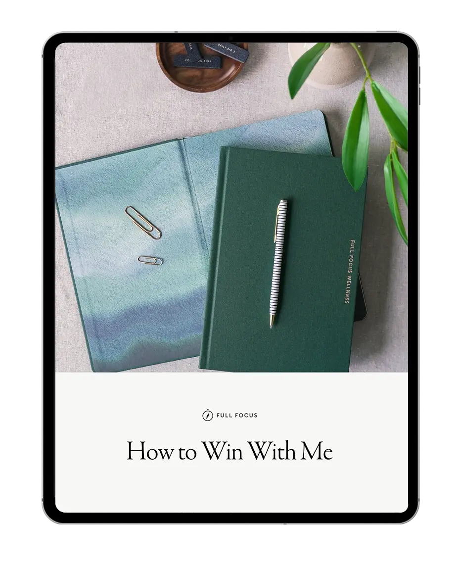 Full Focus Planner with pen, promoting productivity and work-life balance for the Double Win strategy.